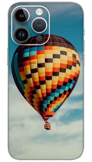 A colorful hot air balloon flying Mobile Skin Wrap